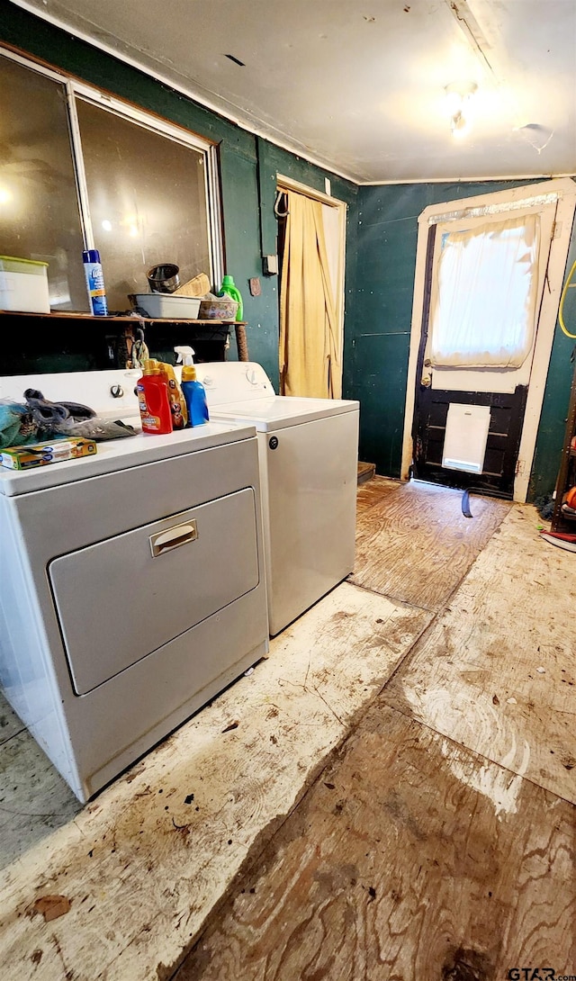 washroom featuring independent washer and dryer