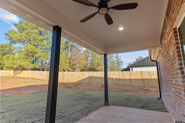 view of patio / terrace featuring ceiling fan