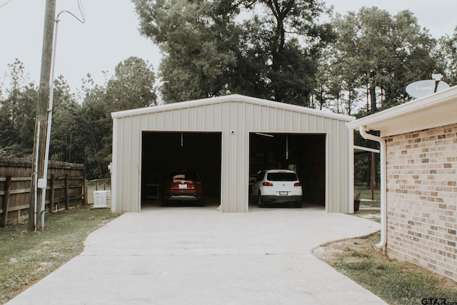 detached garage with fence
