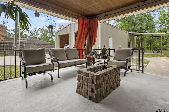 view of patio / terrace with fence and an outdoor living space