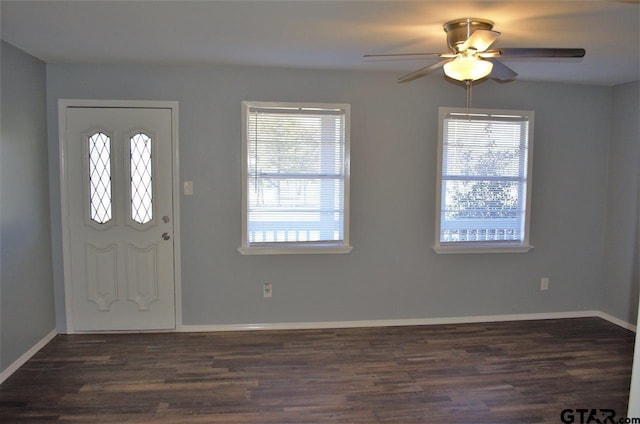 entrance foyer featuring ceiling fan and dark hardwood / wood-style flooring