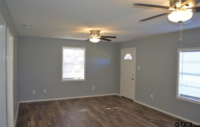 entrance foyer featuring ceiling fan and dark hardwood / wood-style flooring