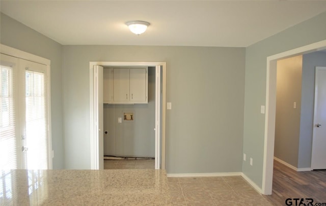 unfurnished room featuring hardwood / wood-style flooring