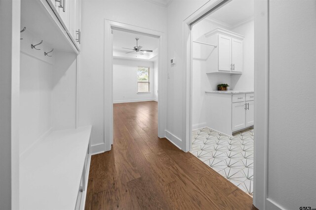 4132 Palo Pinto Creek Cir, Tyler, TX 75703 - mudroom with crown molding, light wood finished floors, a ceiling fan, and baseboards