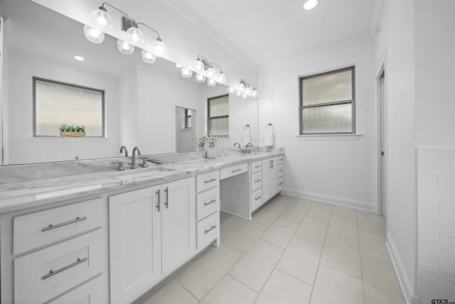 4132 Palo Pinto Creek Cir, Tyler, TX 75703 - bathroom featuring crown molding, double vanity, plenty of natural light, baseboards, and tile patterned flooring