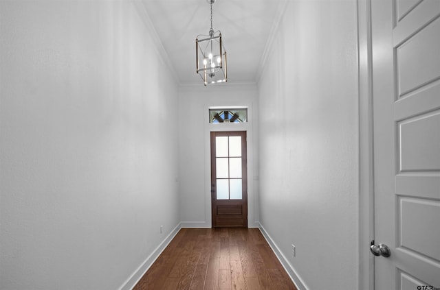 4132 Palo Pinto Creek Cir, Tyler, TX 75703 - doorway featuring ornamental molding, a chandelier, dark wood finished floors, and baseboards