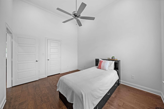4132 Palo Pinto Creek Cir, Tyler, TX 75703 - bedroom with baseboards, a towering ceiling, crown molding, wood finished floors, and a ceiling fan