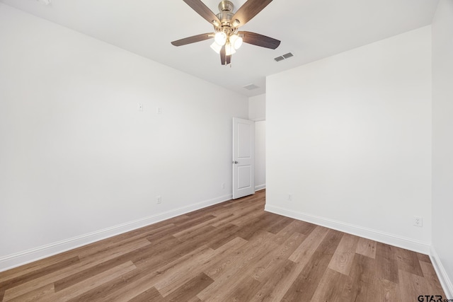 482 Mary Cir, Bullard, TX 75757 - empty room with light wood finished floors, baseboards, and a ceiling fan