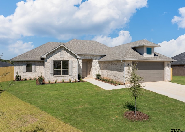 482 Mary Cir, Bullard, TX 75757 - view of front of home with roof with shingles, driveway, brick siding, and a front yard