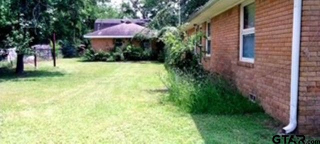 307 Lowry St, Arp, TX 75750 - view of grassy yard
