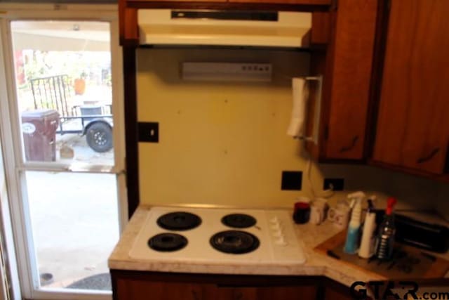 kitchen featuring white stovetop