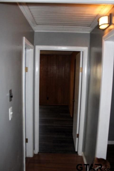 307 Lowry St, Arp, TX 75750 - corridor featuring dark wood-style flooring and ornamental molding
