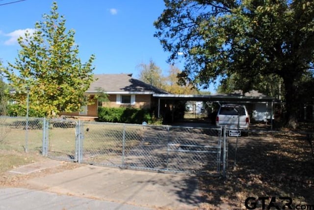 view of front of house featuring a carport