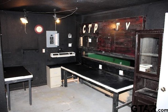 307 Lowry St, Arp, TX 75750 - miscellaneous room featuring electric panel and concrete flooring