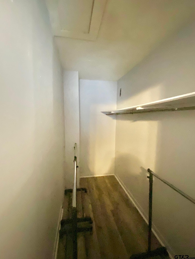 laundry area with hardwood / wood-style floors