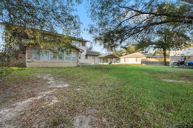 view of yard with fence