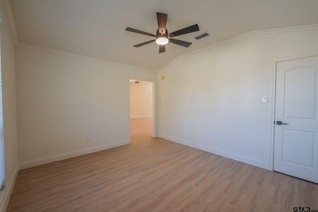 spare room with ceiling fan, light hardwood / wood-style flooring, vaulted ceiling, and ornamental molding