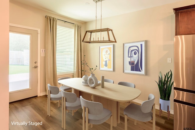 dining area with light wood-type flooring