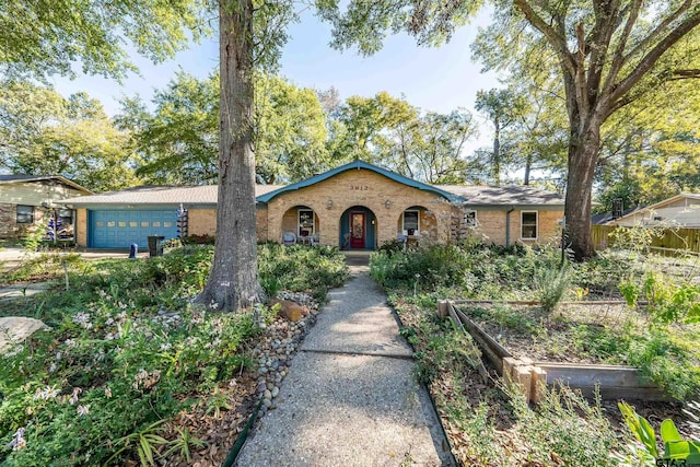 ranch-style home with a garage