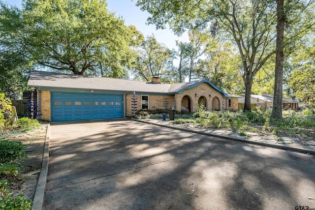 ranch-style house with a garage