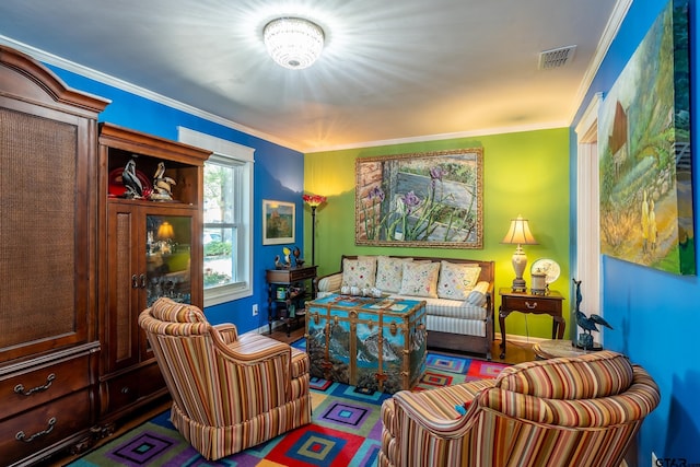 living room featuring crown molding