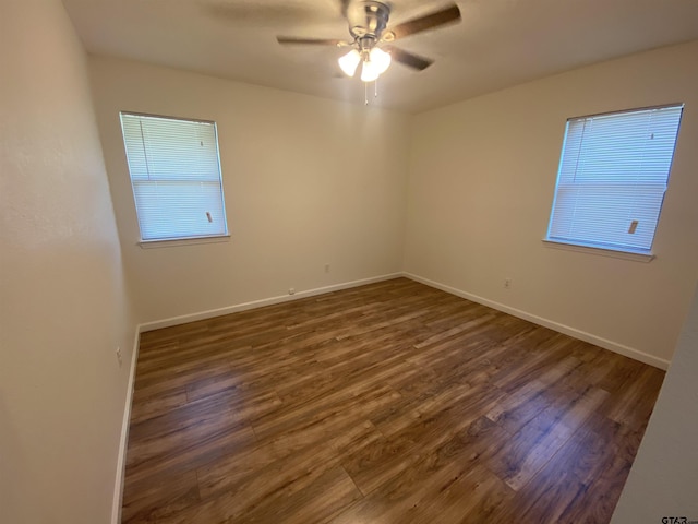 3903 Appletree Ln, Tyler, TX 75701 - empty room featuring dark wood finished floors and ceiling fan