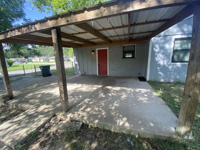 3903 Appletree Ln, Tyler, TX 75701 - view of patio / terrace featuring a carport