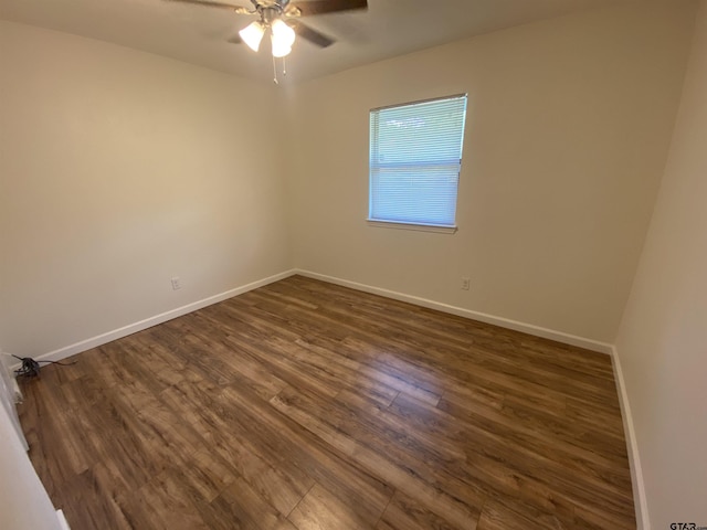 3903 Appletree Ln, Tyler, TX 75701 - spare room featuring dark wood finished floors and a ceiling fan