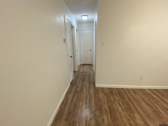 3903 Appletree Ln, Tyler, TX 75701 - corridor with dark wood-style flooring and baseboards