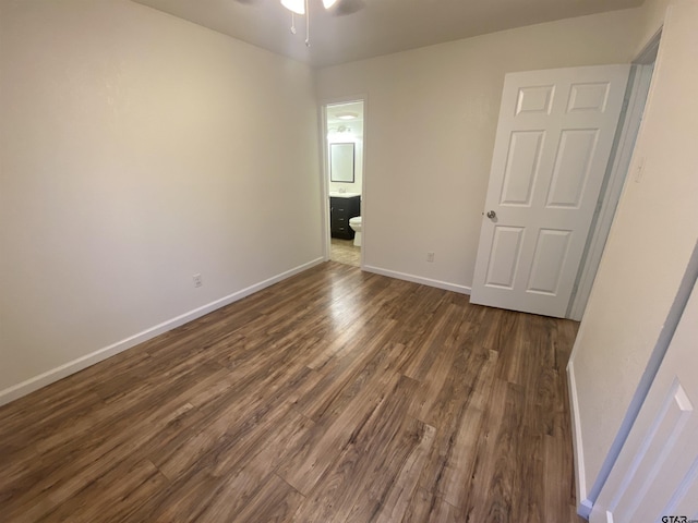 3903 Appletree Ln, Tyler, TX 75701 - unfurnished room featuring dark wood-style flooring and a ceiling fan