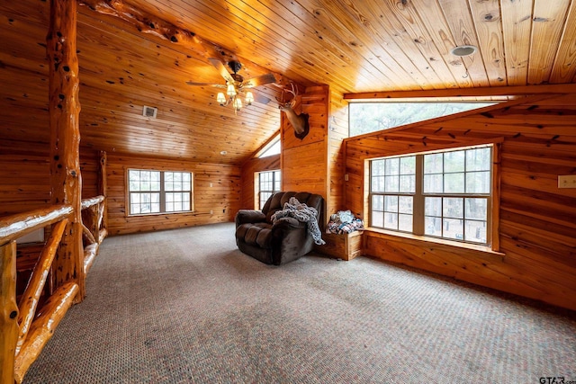 additional living space with lofted ceiling, carpet, wood ceiling, and wooden walls