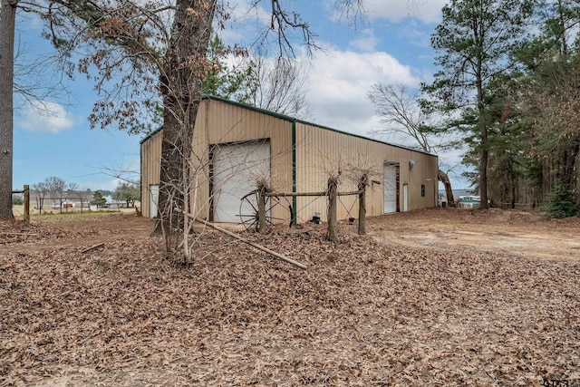 view of outbuilding featuring a garage