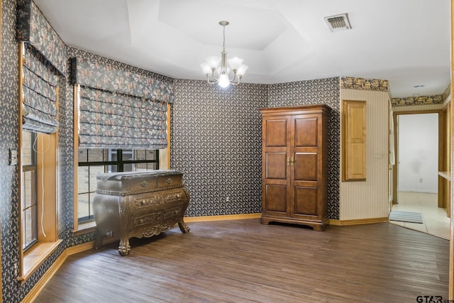 205 Turnberry Cir, Mount Pleasant, TX 75455 - sitting room featuring wallpapered walls, wood finished floors, a chandelier, and baseboards