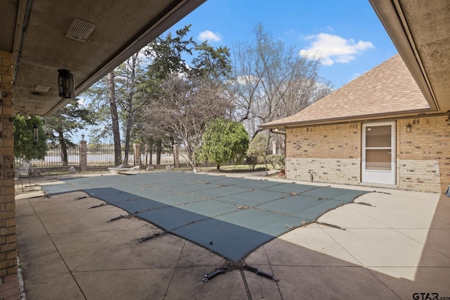205 Turnberry Cir, Mount Pleasant, TX 75455 - view of swimming pool featuring a patio area and fence