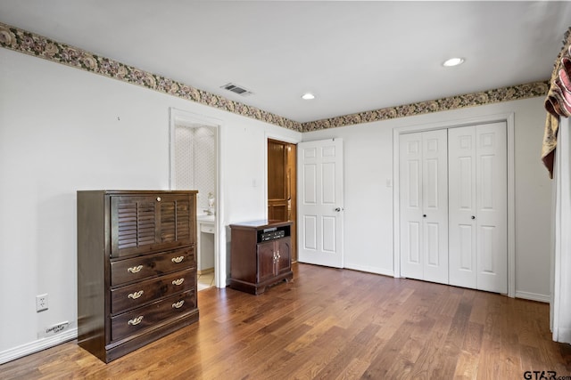 205 Turnberry Cir, Mount Pleasant, TX 75455 - bedroom with wood finished floors, a closet, recessed lighting, and baseboards