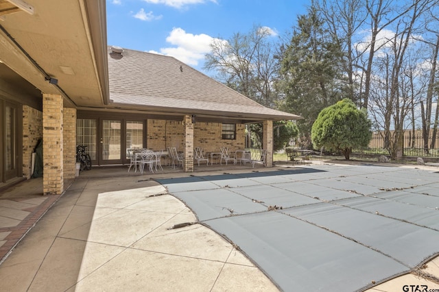 205 Turnberry Cir, Mount Pleasant, TX 75455 - view of swimming pool with fence and a patio