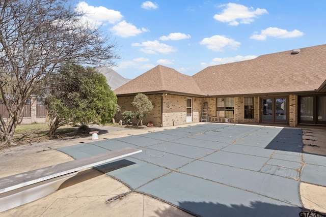 205 Turnberry Cir, Mount Pleasant, TX 75455 - view of pool featuring a diving board and a patio