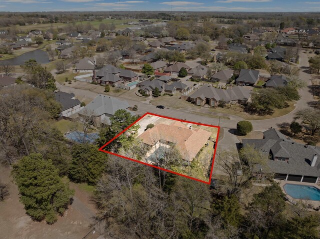 205 Turnberry Cir, Mount Pleasant, TX 75455 - aerial perspective of suburban area featuring property boundaries highlighted and a large body of water