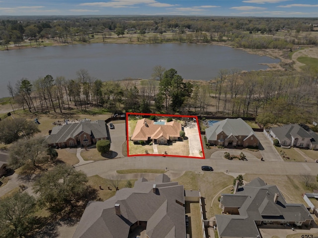 205 Turnberry Cir, Mount Pleasant, TX 75455 - view of property location with a nearby body of water, nearby suburban area, and property boundaries highlighted