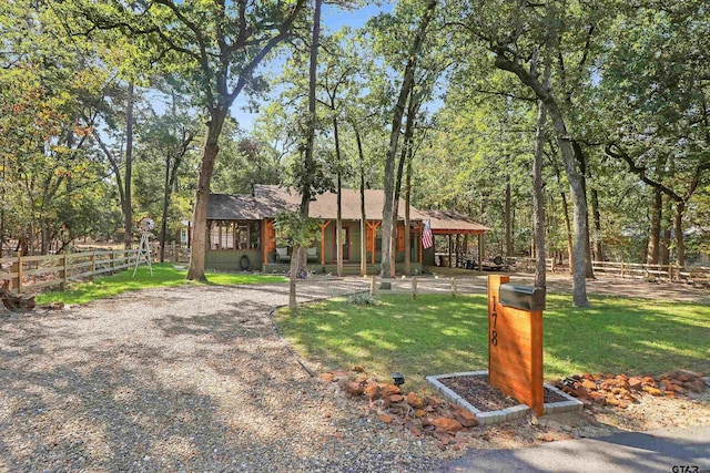 view of front of home featuring a front lawn