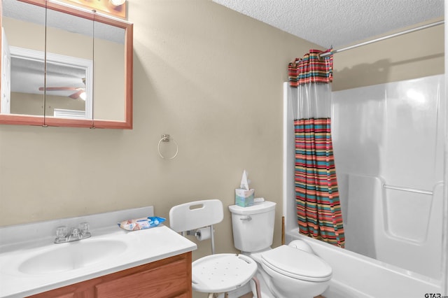 full bathroom featuring vanity, toilet, shower / tub combo, and a textured ceiling