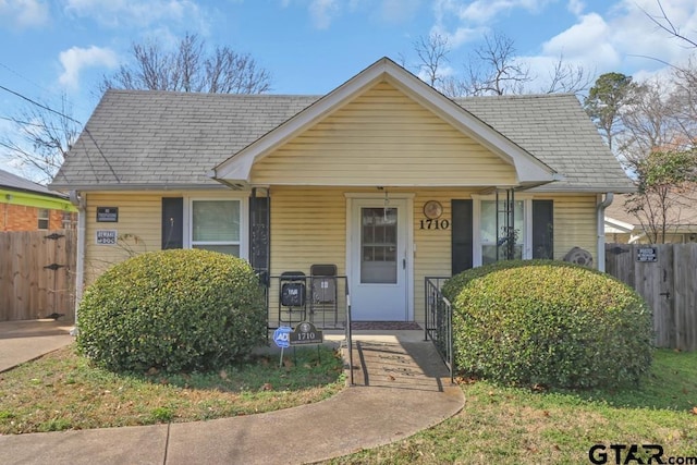 bungalow-style home with covered porch