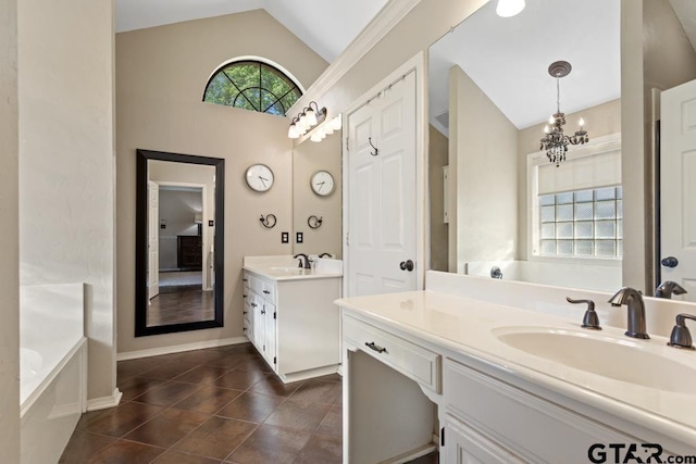 bathroom with a garden tub, tile patterned flooring, two vanities, a sink, and lofted ceiling
