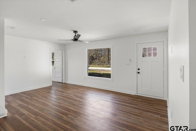 entryway featuring ceiling fan, baseboards, and wood finished floors