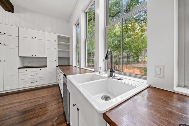 23611 Ridgeview Dr, Bullard, TX 75757 - kitchen with open shelves, ornamental molding, dark wood-style floors, white cabinetry, and dark countertops