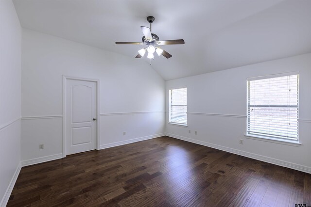 2056 Balsam Gap, Tyler, TX 75703 - unfurnished room with a ceiling fan, baseboards, vaulted ceiling, and dark wood-style flooring