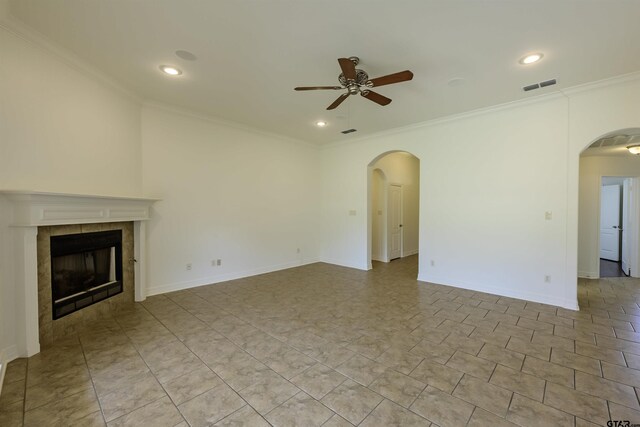 2056 Balsam Gap, Tyler, TX 75703 - unfurnished living room with arched walkways, crown molding, visible vents, and a ceiling fan