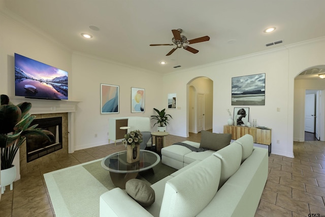 2056 Balsam Gap, Tyler, TX 75703 - living room featuring a ceiling fan, arched walkways, ornamental molding, and visible vents