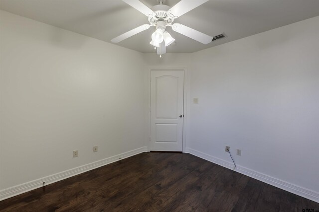 2056 Balsam Gap, Tyler, TX 75703 - unfurnished room with baseboards, visible vents, ceiling fan, and dark wood-style flooring