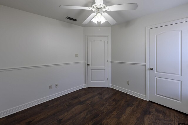 2056 Balsam Gap, Tyler, TX 75703 - unfurnished room featuring baseboards, a ceiling fan, dark wood-type flooring, and visible vents